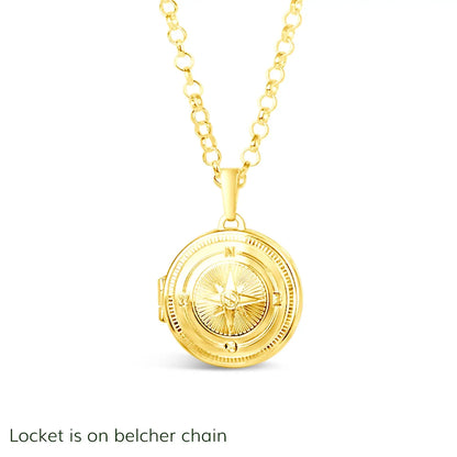 Gold compass locket on a belcher chain against a white background