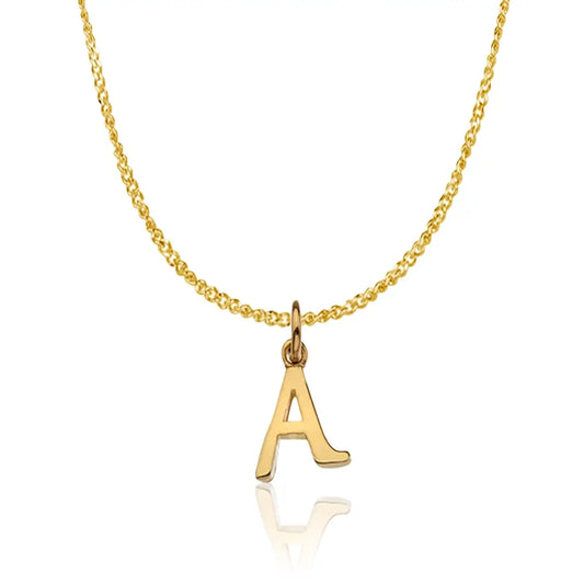 Solid 9 carat gold alphabet initial necklace 'A' hanging on a solid 9 carat gold close curb chain photographed on a white background - Lily Blanche