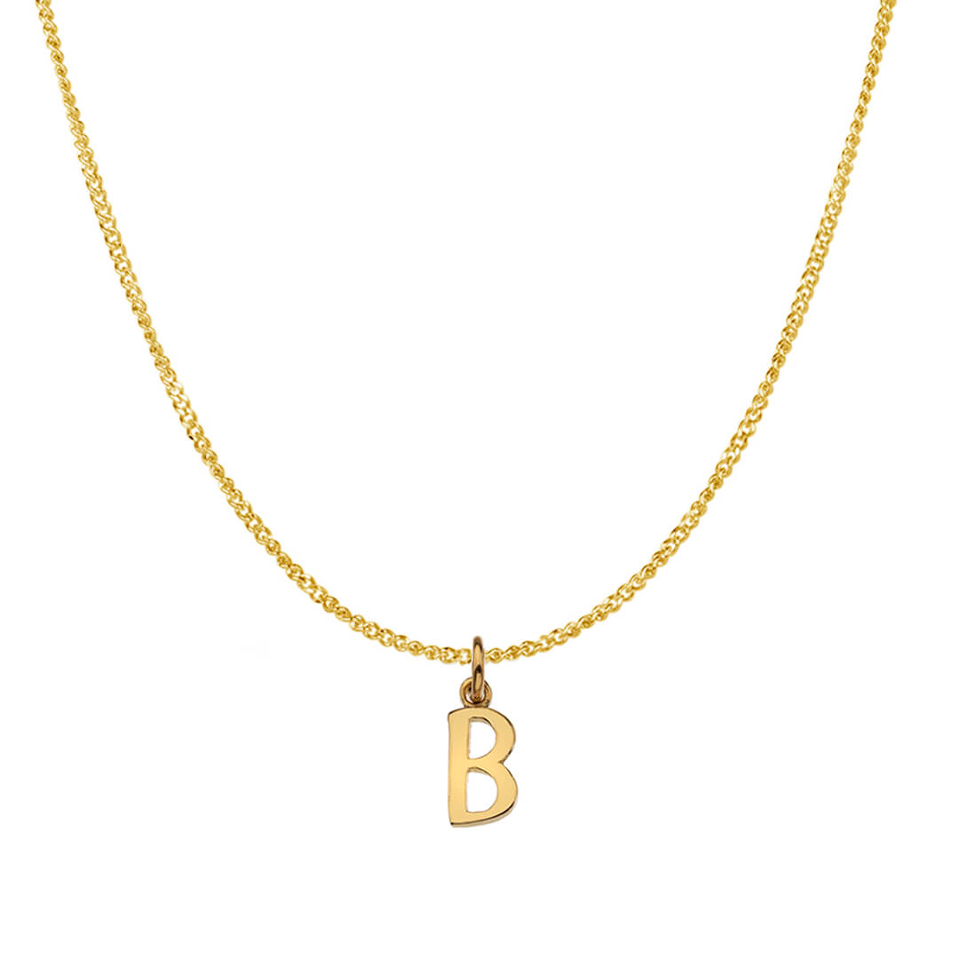  initial necklace in solid gold on a curb chain
