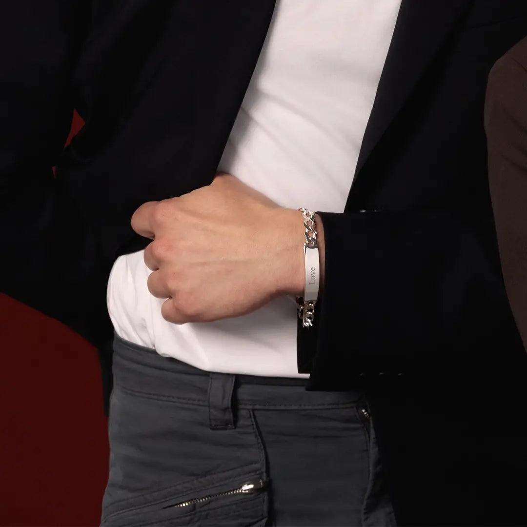 Male model wearing a medium silver ID bracelet