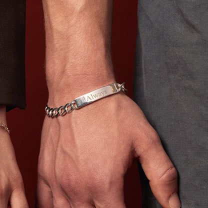 Lily Blanche men's sterling silver ID bracelet featuring a chunky curb chain and polished identification bar engraved with the word "Always", worn on the wrist.