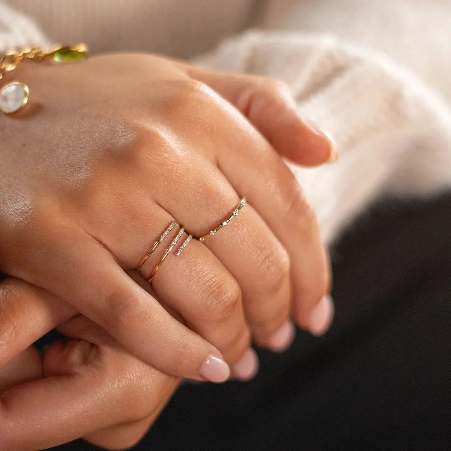 model wearing multi diamond gold ring