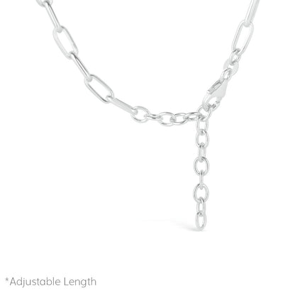 silver paperclip chain close up of chain catch on white background