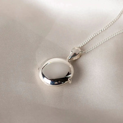 Silver round Necklace for ashes, memorial necklace, locket with one photo and ashes storage, silver curb chain, engraving, silk background