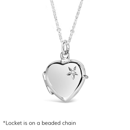 2 photo diamond heart locket on beaded chain closed on a white background