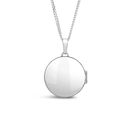 back view of a Silver round compass locket on a chain against a white background