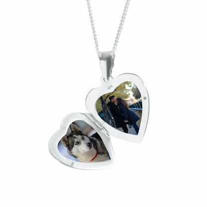 opened heart locket in white gold on a white background