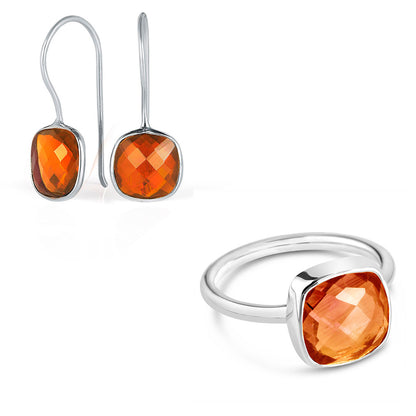 carnelian earrings and cocktail ring in silver on a white background