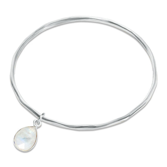 white quartz charm bangle in silver on a white background