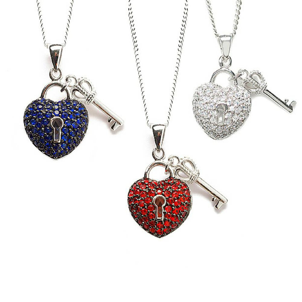 three key to my heart pendants in different colours on a white background