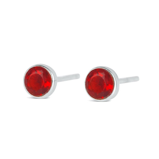 Garnet mini stud earrings in silver facing the front on a white background