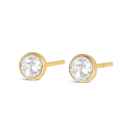 White quartz mini stud earrings in gold facing the front on a white background
