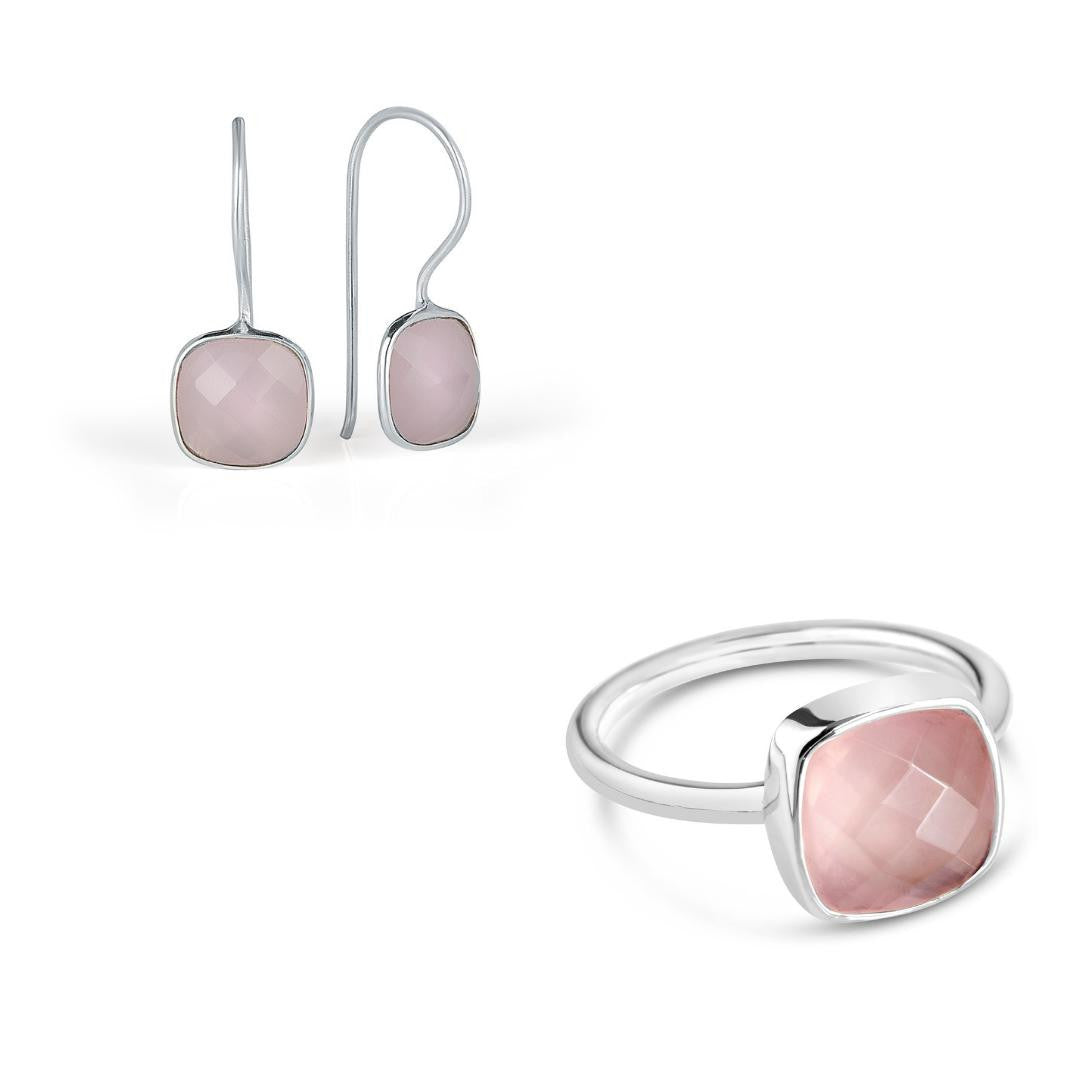 rose quartz cocktail rings and earrings on a white background