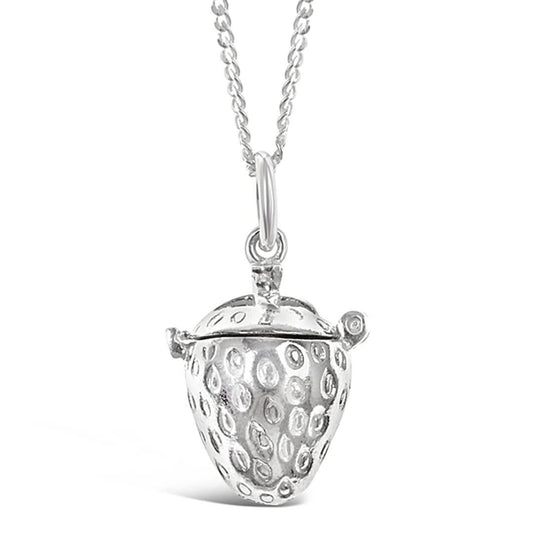 magical strawberry charm in silver on a white background