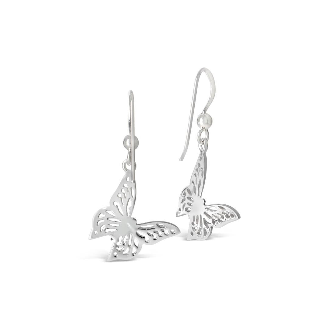 silver butterfly earrings on a white background