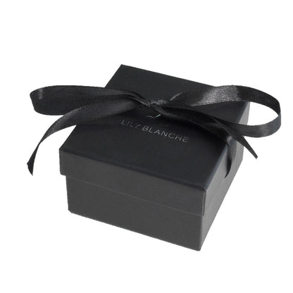 black ribbon-tied Lily blanche gift box on a white background 