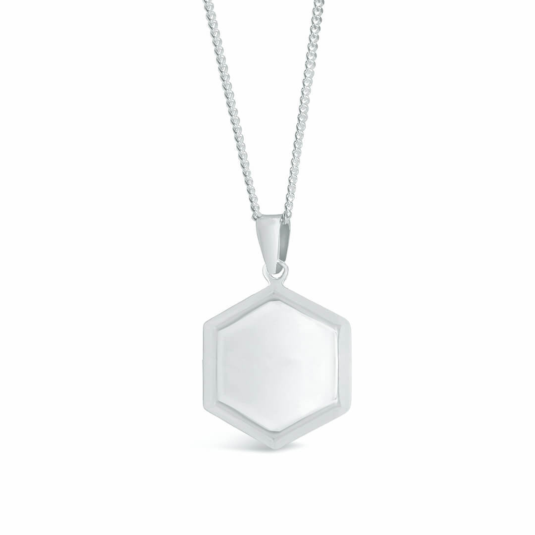 front view of men's hexagon locket in silver on a white background 