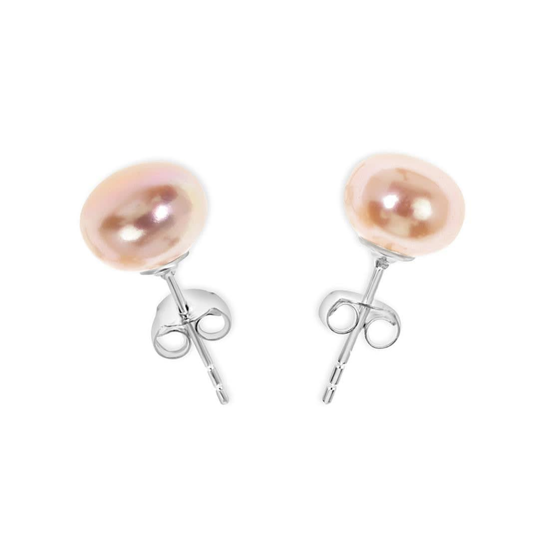 classic pearl earrings in champagne on a white background