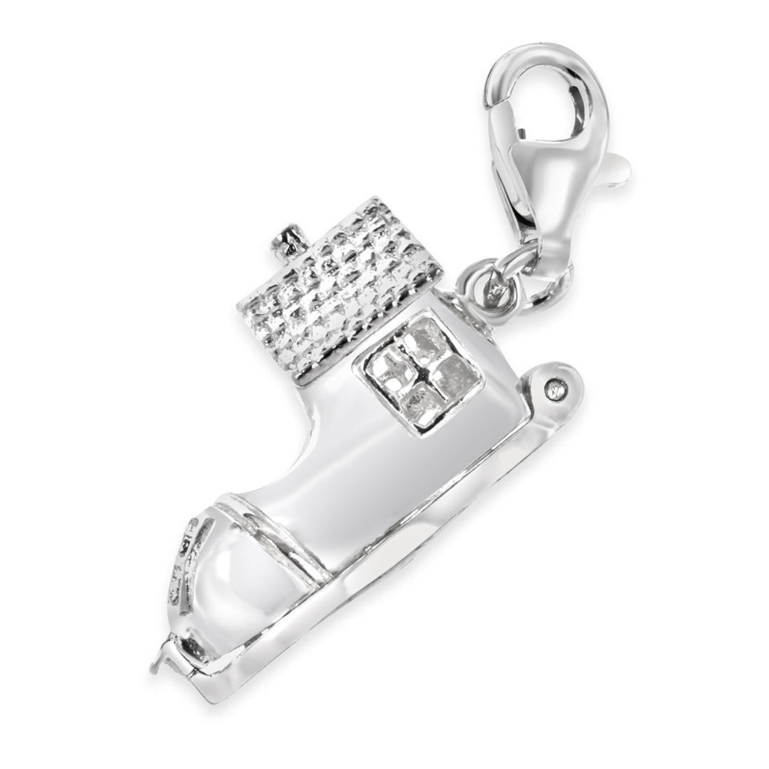 magical silver shoe charm on a white background