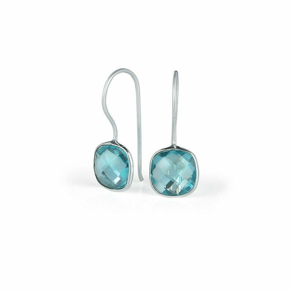 blue topaz earrings in silver on a white background