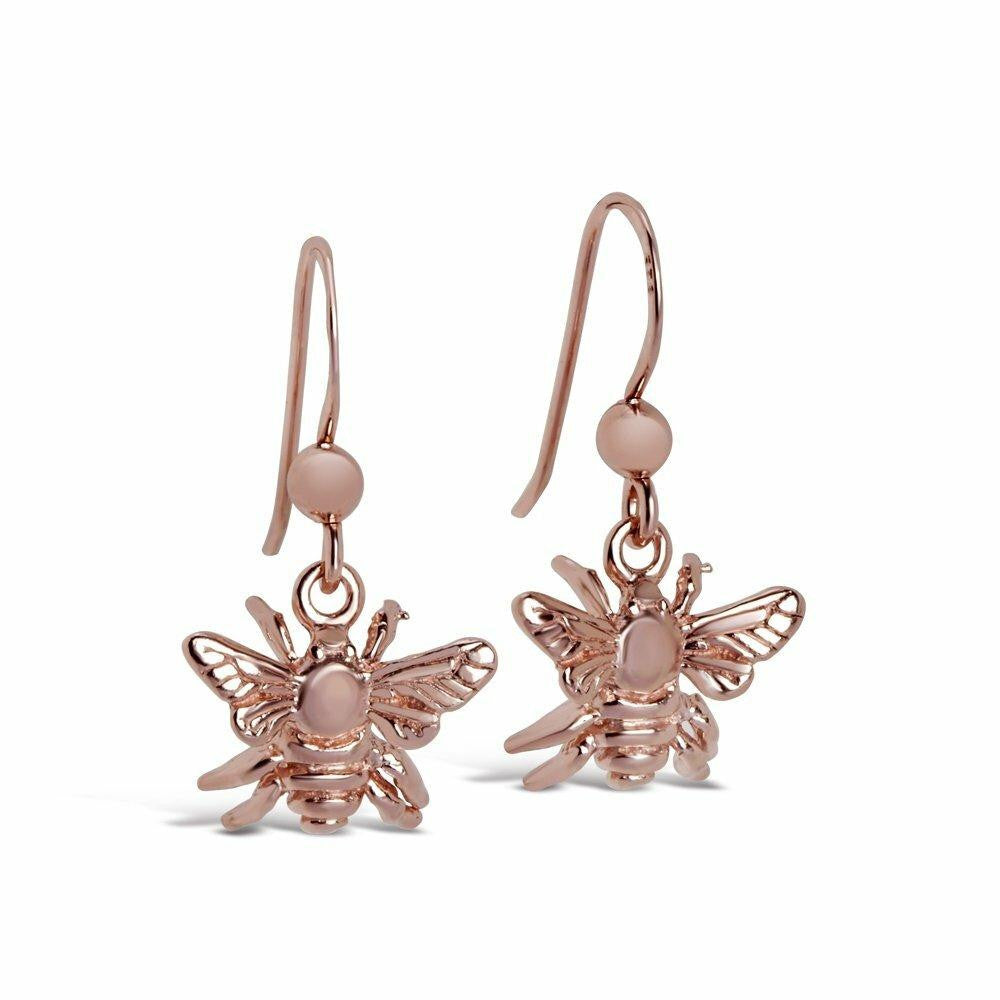 rose gold bee earrings on a white background