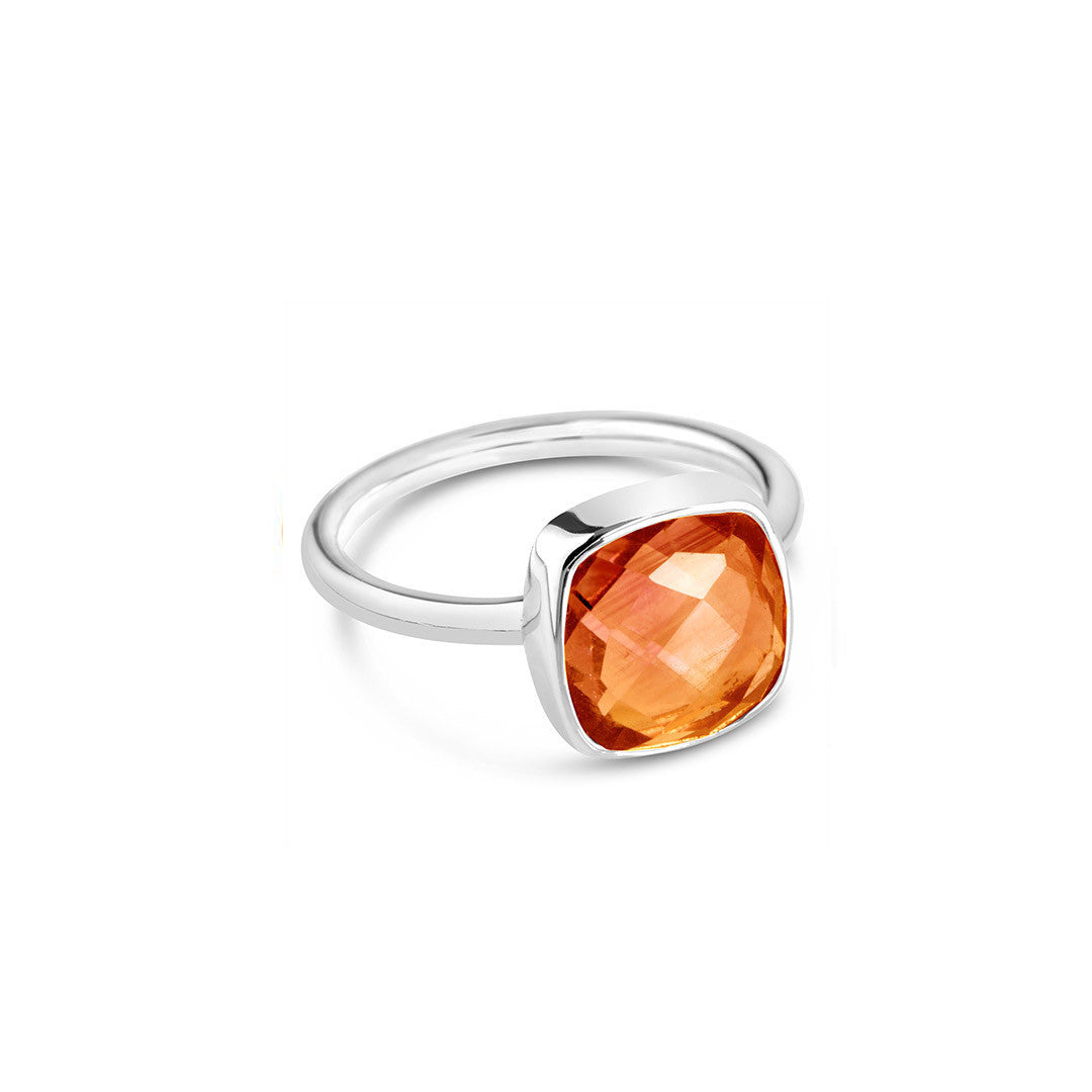carnelian cocktail ring in silver on a white background 