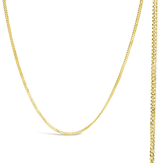 gold curb chain on a white background