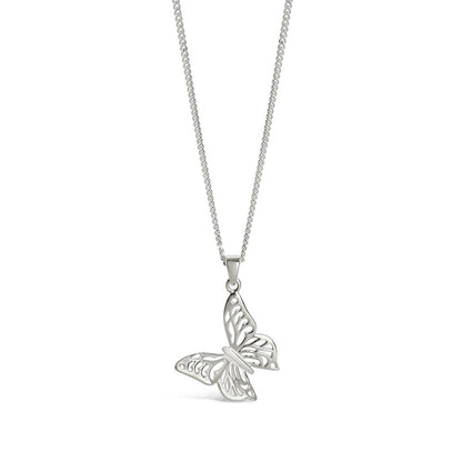butterfly pendant in silver on a white background