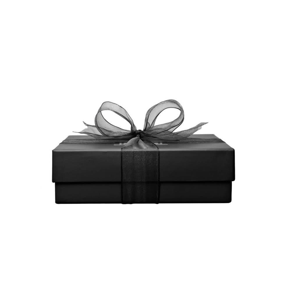 black ribbon-tied lily blanche gift box on a white background