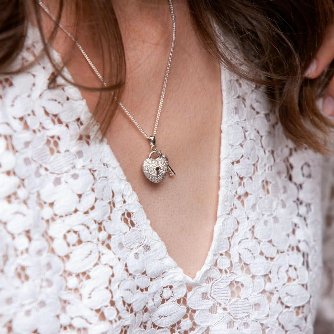 model wearing key to my heart pendant in white 