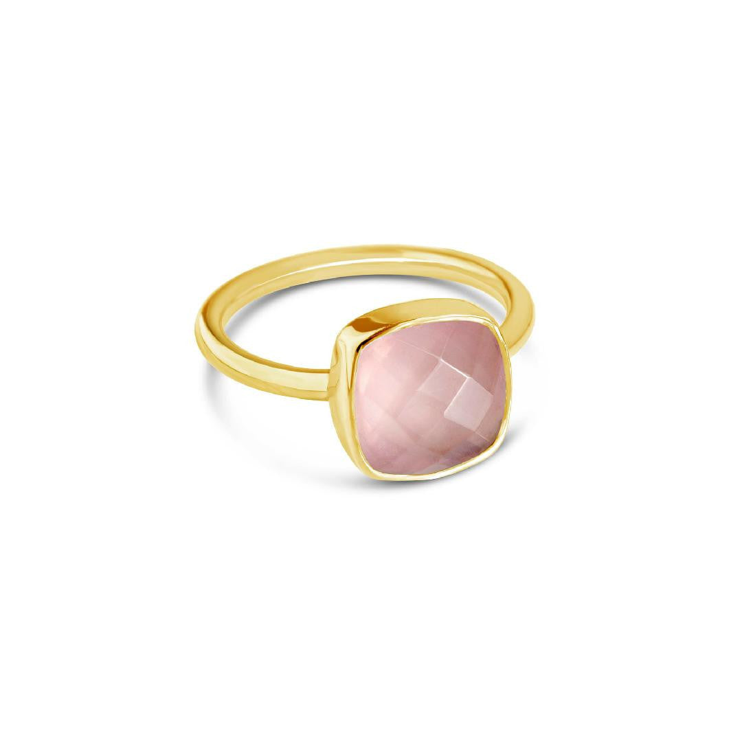 rose quartz cocktail ring in gold on a white background
