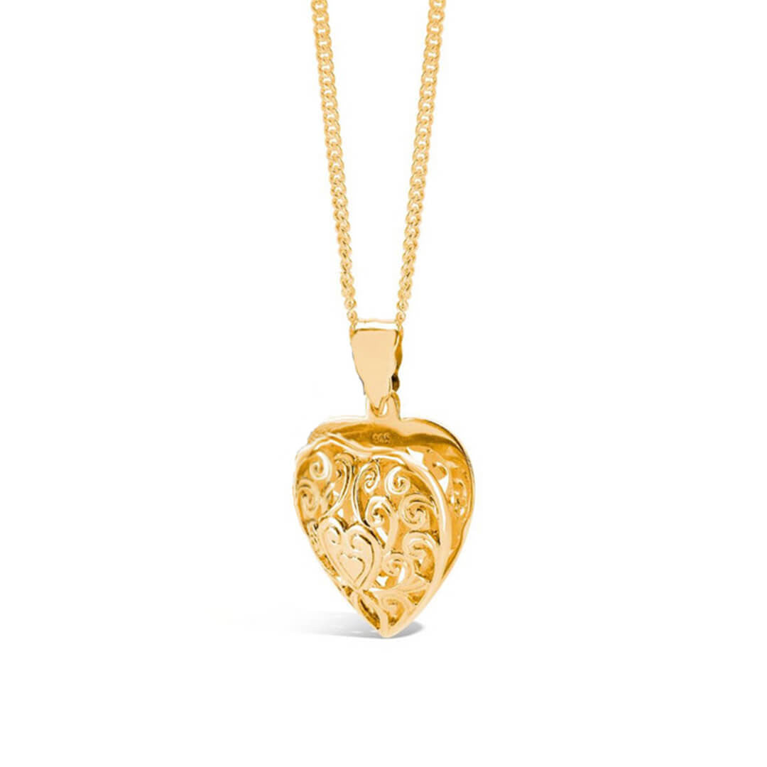heart locket necklace in gold on a white background