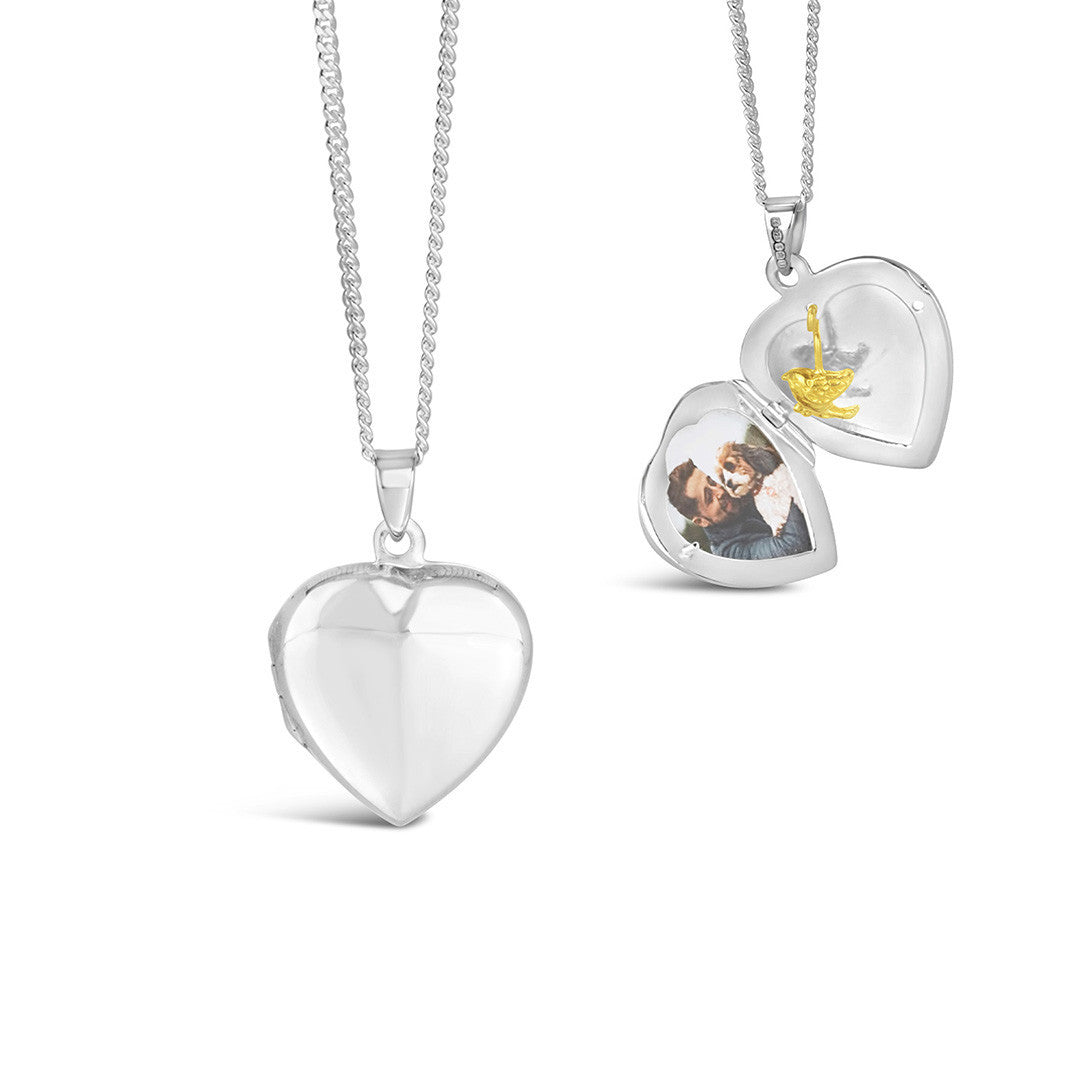 secret silver heart locket with gold bird and inside and outside view of locket
