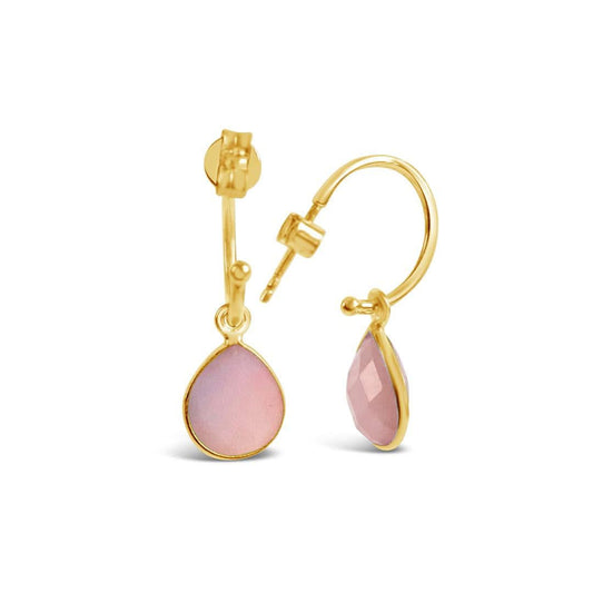 pink opal drop hoop earrings in gold on a white background