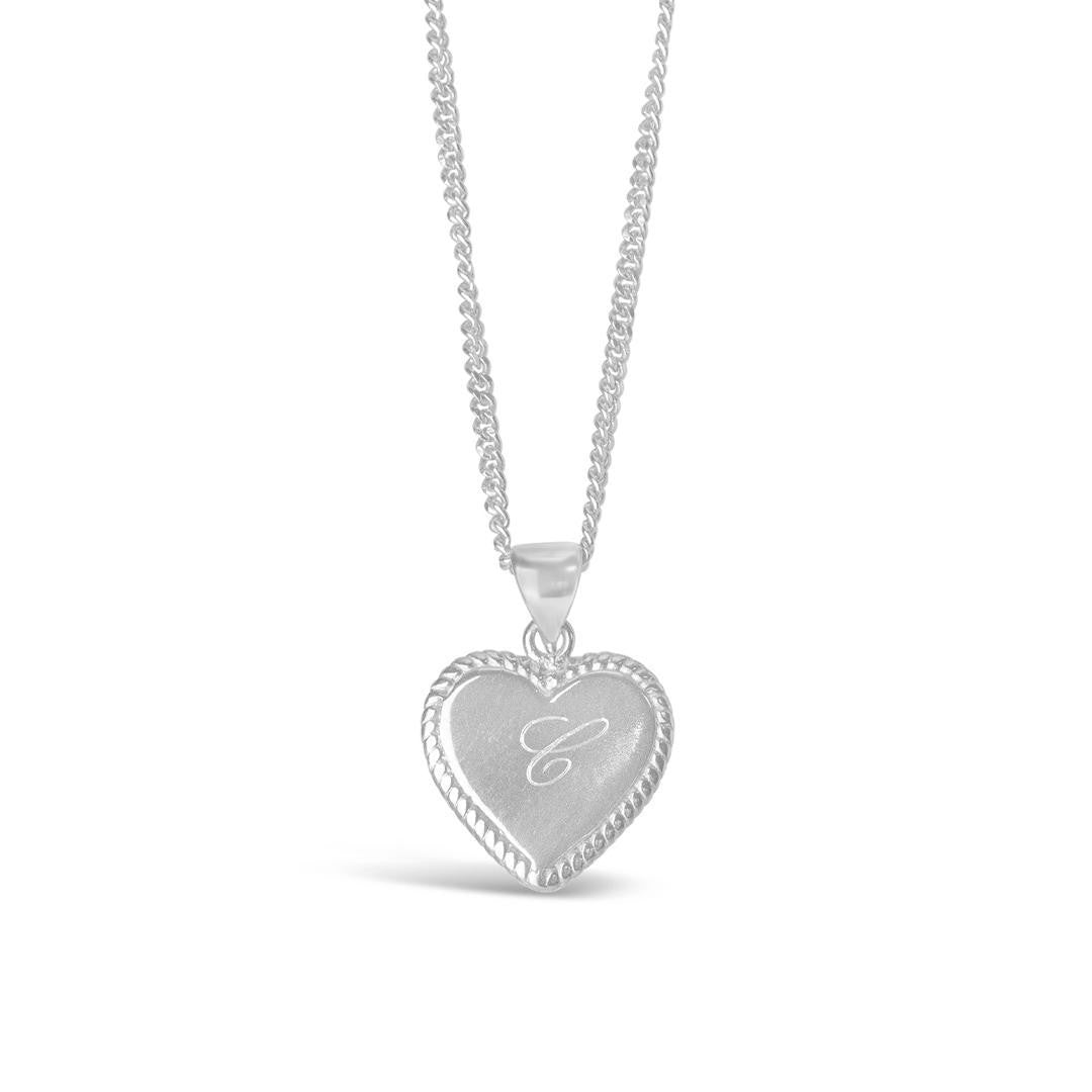 engravable heart necklace in silver on a white background