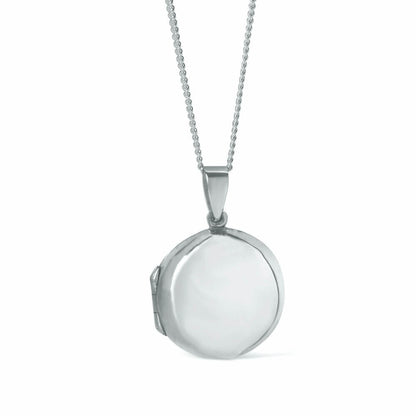 round locket necklace in silver on a white background