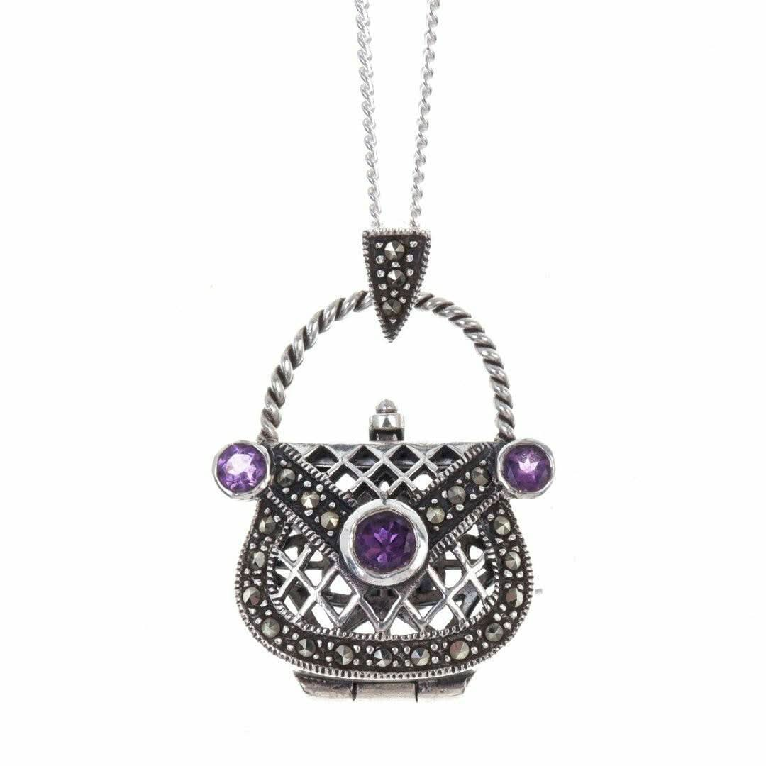 amethyst handbag locket in silver on a white background