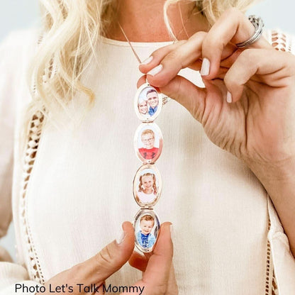 women holding rose gold four photo butterfly locket to reveal photos