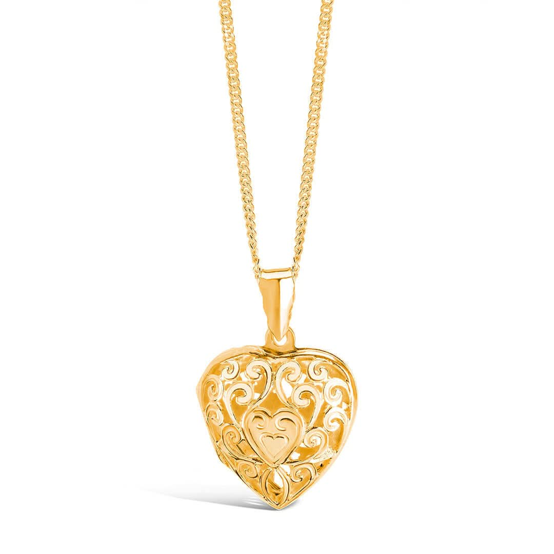 heart locket necklace in gold on a white background