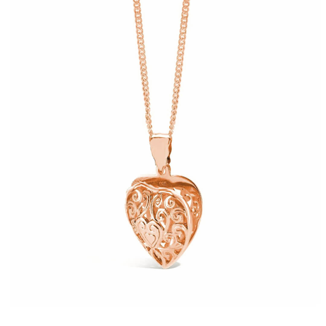 heart locket in rose gold on a white background 