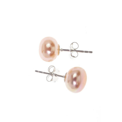 classic pearl earrings in champagne on a white background
