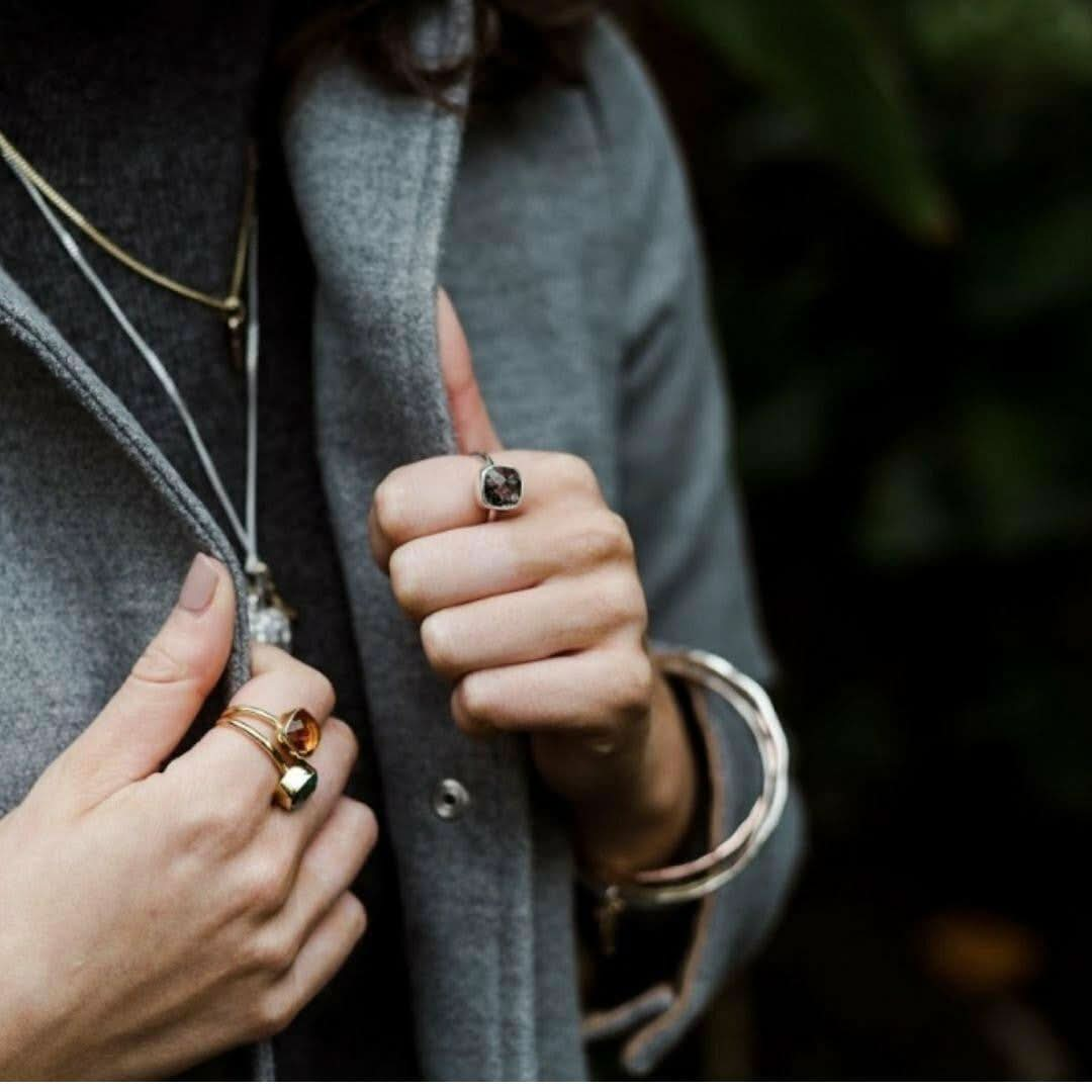 closeup of model wearing key bangles