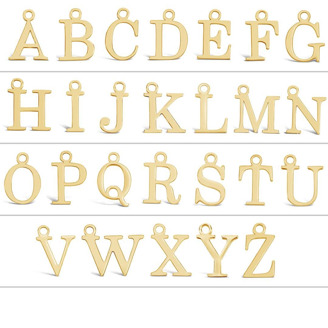 grid of gold initial charms on a white background