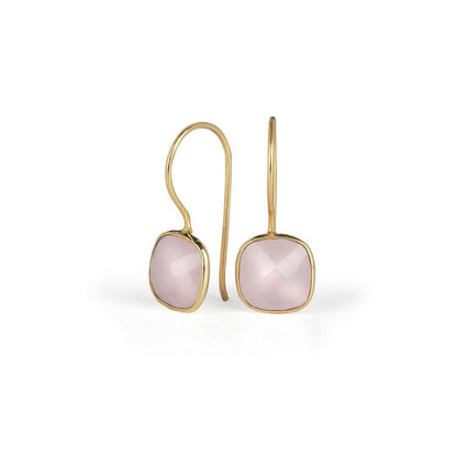 rose quartz cocktail ring in gold on a white background