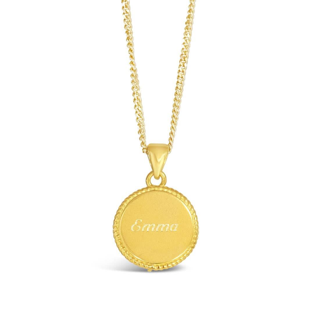 engravable disc necklace in gold on a white background
