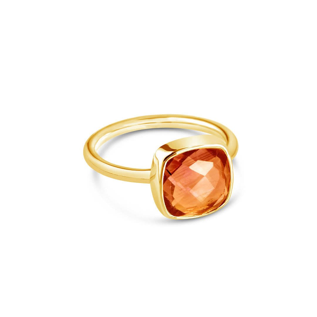 carnelian cocktail ring in gold on a white background