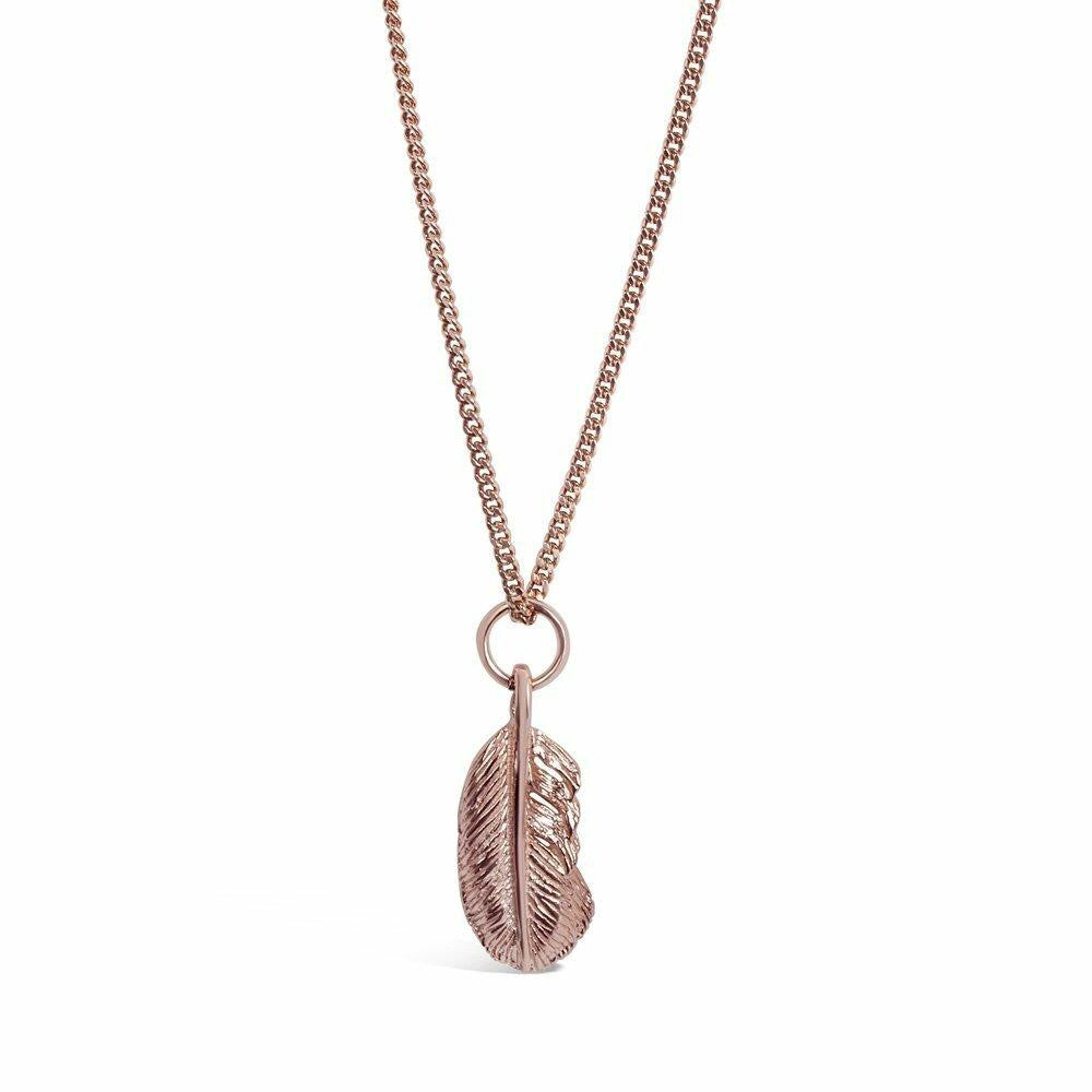 feather pendant in rose gold on a white background