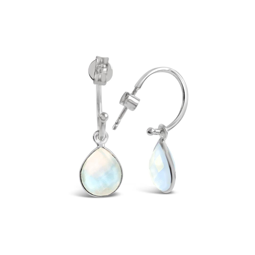 moonstone drop hoop earrings in silver on a white background