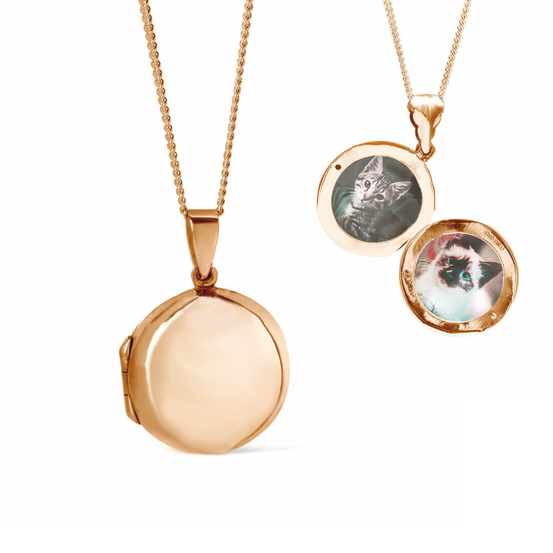round locket necklace in rose gold with photos inside on a white background