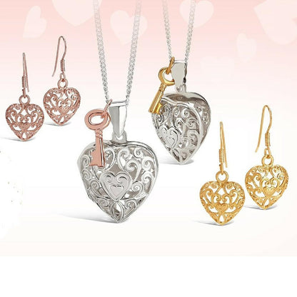 collection of heart shaped jewellery on a white background